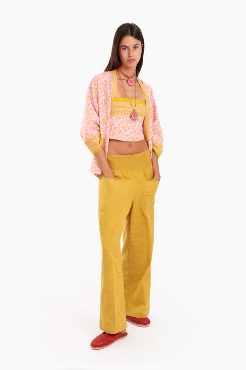 Short top in cotton with adjustable straps